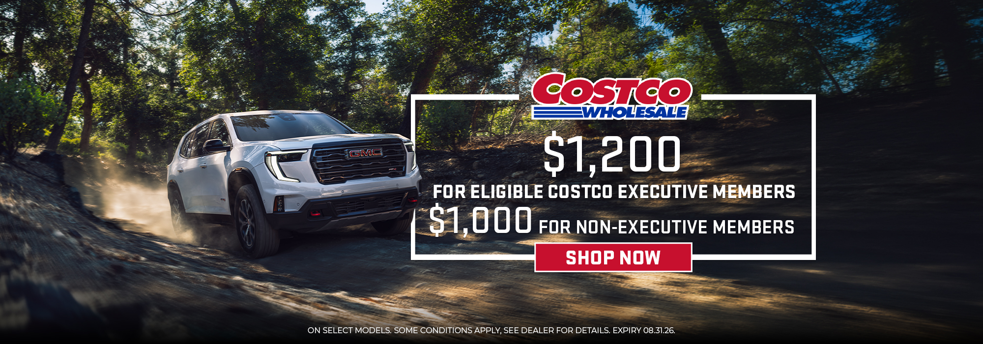 Costco Wholesale offer: $1,200 for executive members, $1,000 for non-members. White GMC SUV on a wooded trail.