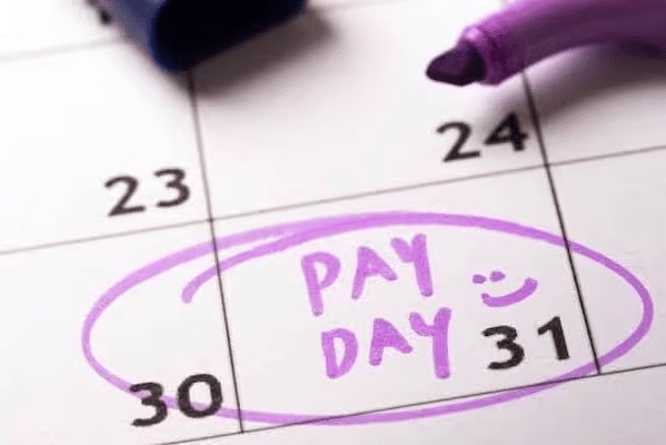 Calendar with "Pay Day" circled on the 31st in purple, marked with a smiley face.