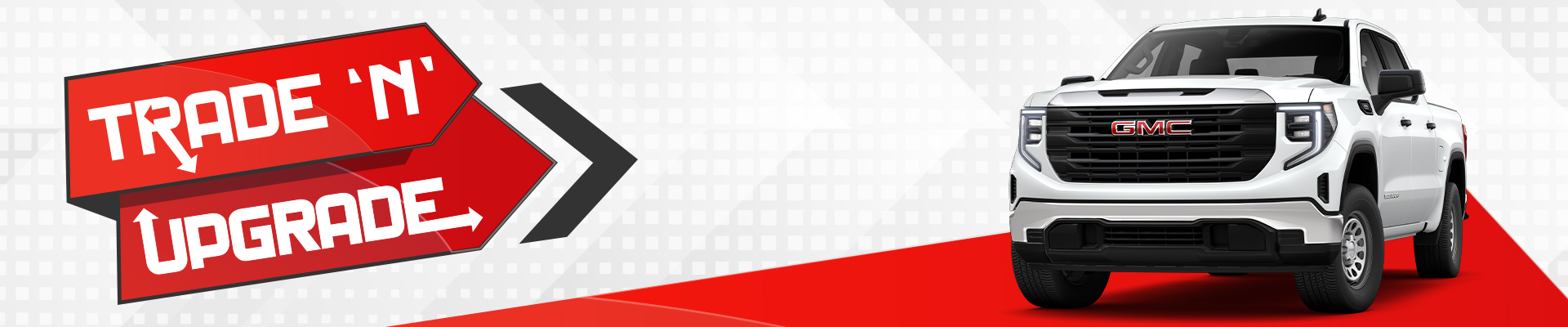 White GMC truck on red and white background with "Trade 'N' Upgrade" arrow graphic.