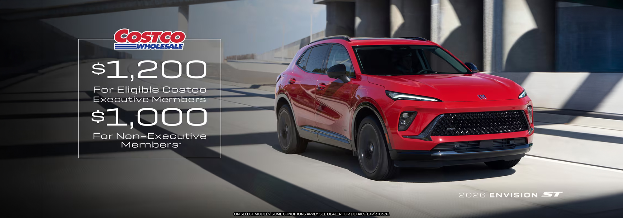 Red 2026 Envision ST on road, Costco savings: $1,200 for executive, $1,000 for non-executive members.