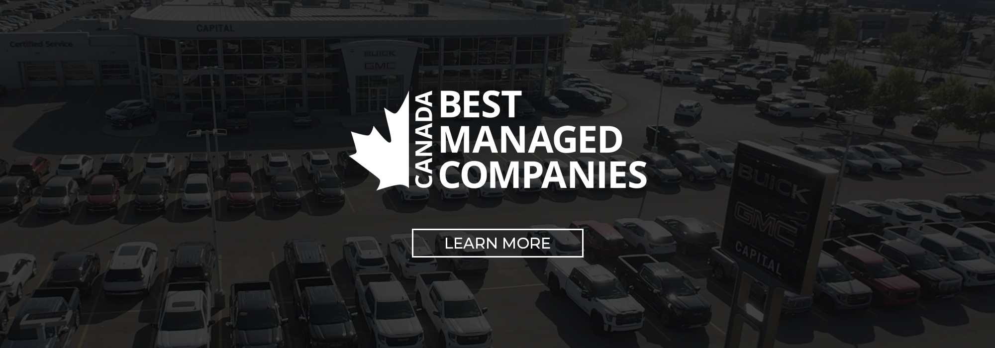 Aerial view of a busy car dealership with the text "Canada's Best Managed Companies" overlayed.