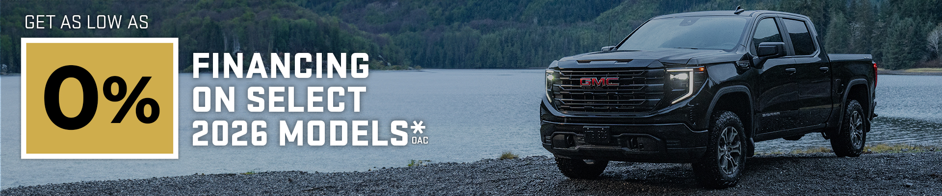 Black GMC truck by a lake with text offering 0% financing on select 2026 models.
