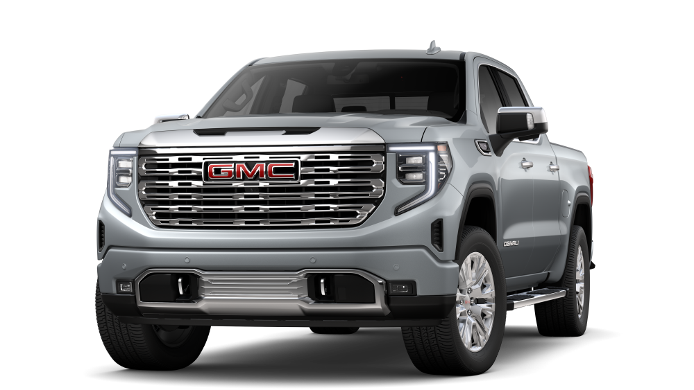 White GMC Sierra pickup truck with a bold front grille and side view.